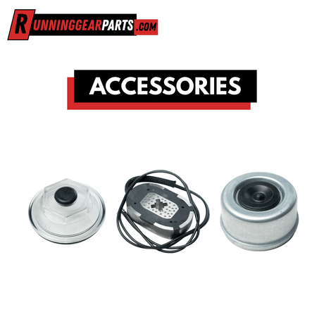 Accessories include three small round metal components: two silver housings with black centers and one perforated plate with a coiled black cable.