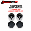 Four trailer bearing protectors