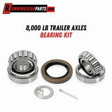 Trailer Axle Bearing Kit with silver steel roller bearings, a dark rubber grease seal, washer and cotter pin.