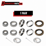 Trailer Axle Bearing Kit with silver steel tapered bearings and races, black-and-brown grease seals, cotter pins and washers.