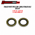 Two metal trailer axle seals